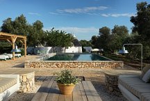 Trulli Bianchemura_pool area with deckchairs and cozy seating