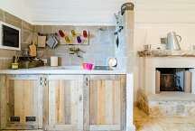 Trulli Matale_dependance kitchen-living with fireplace